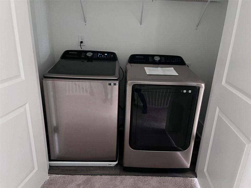1654 Florence Run Northwest Atlanta, GA 30318 - Photo 14 of 41 a utility room with wooden floor washer and dryer