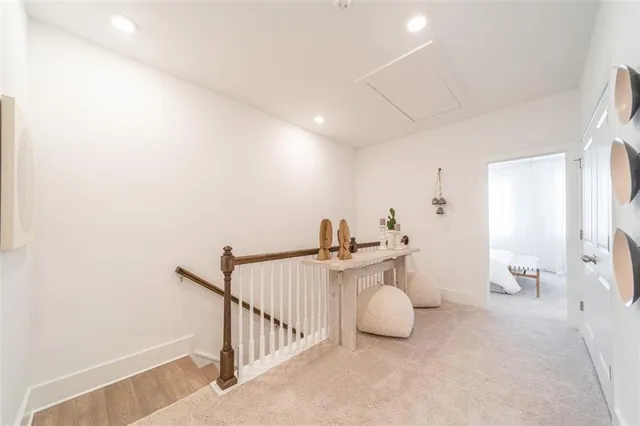 a view of a livingroom with white furniture