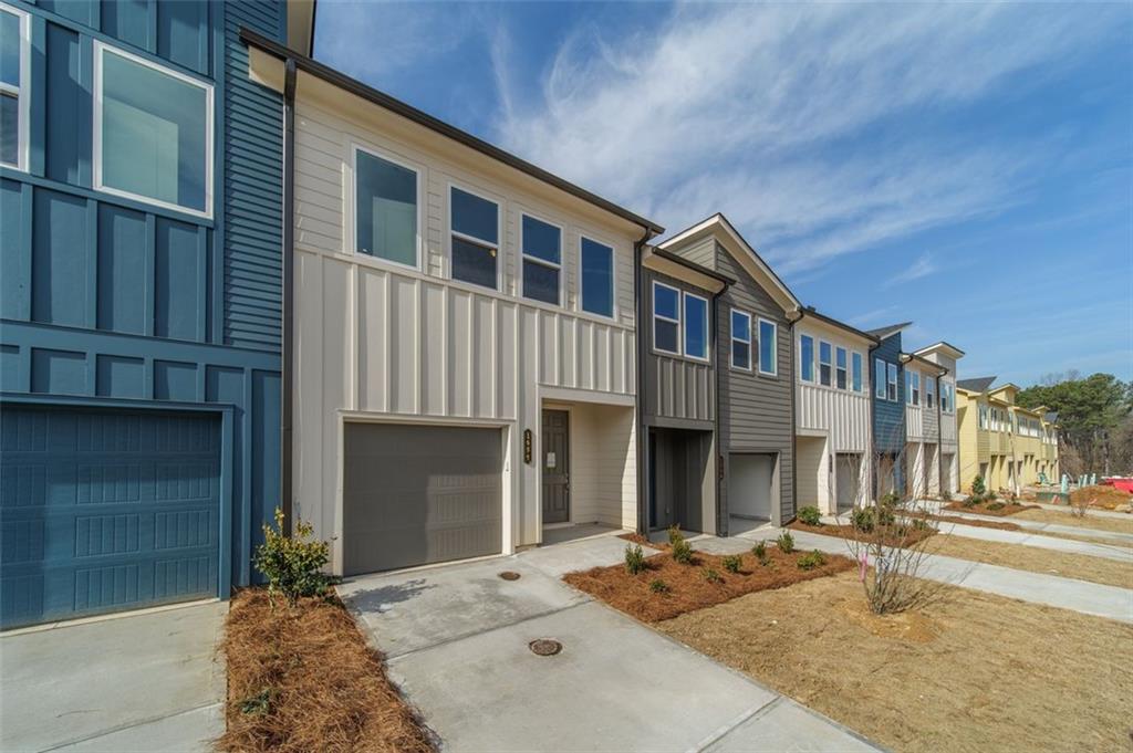 1654 Florence Run Northwest Atlanta, GA 30318 - Photo 2 of 41 a front view of a building