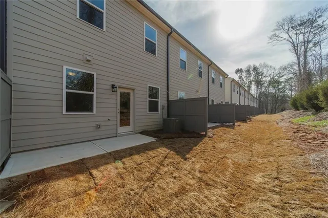 a view of backyard and tree