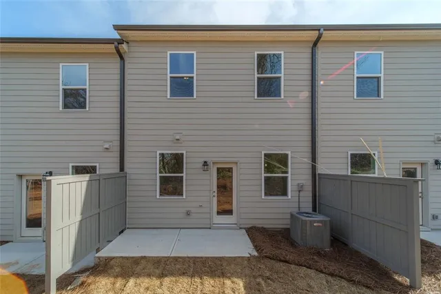 a view of a pathway along the house