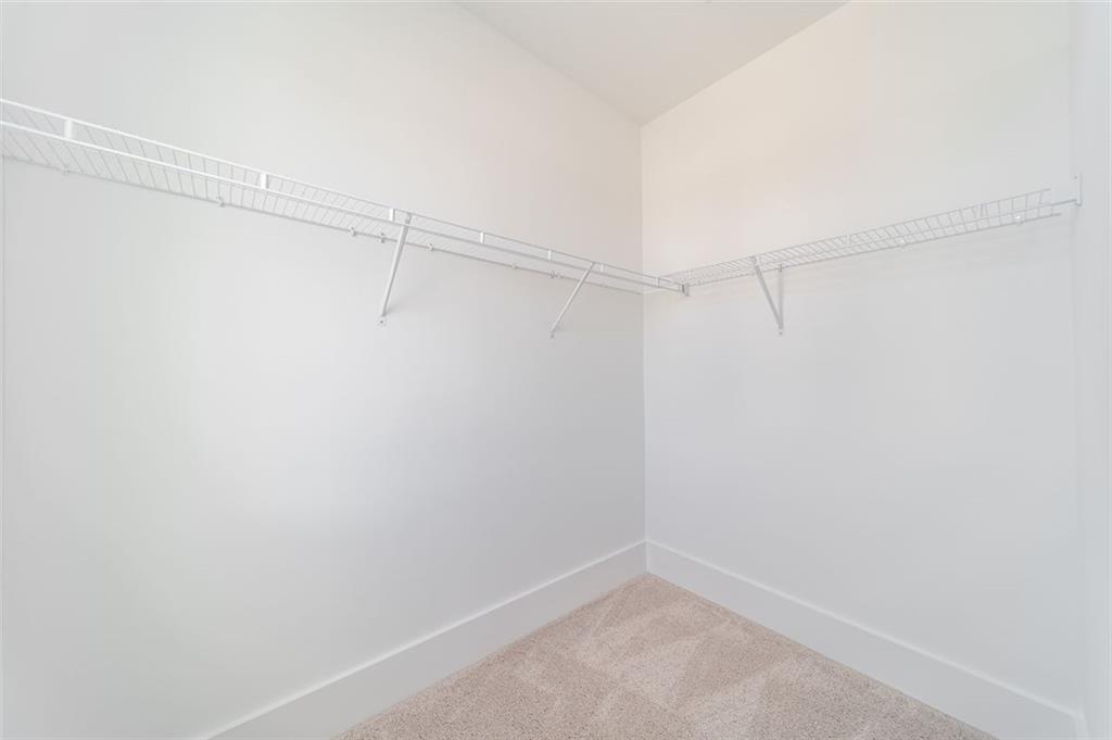 1654 Florence Run Northwest Atlanta, GA 30318 - Photo 8 of 41 a view of a room with racks on the wall