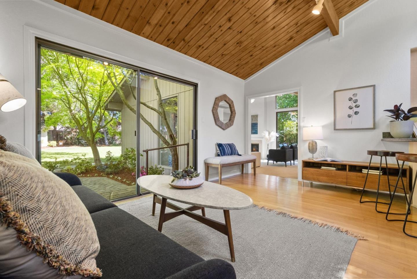 886 Berkeley Avenue Menlo Park, CA 94025 - Photo 12 of 46 a living room with furniture and a large window