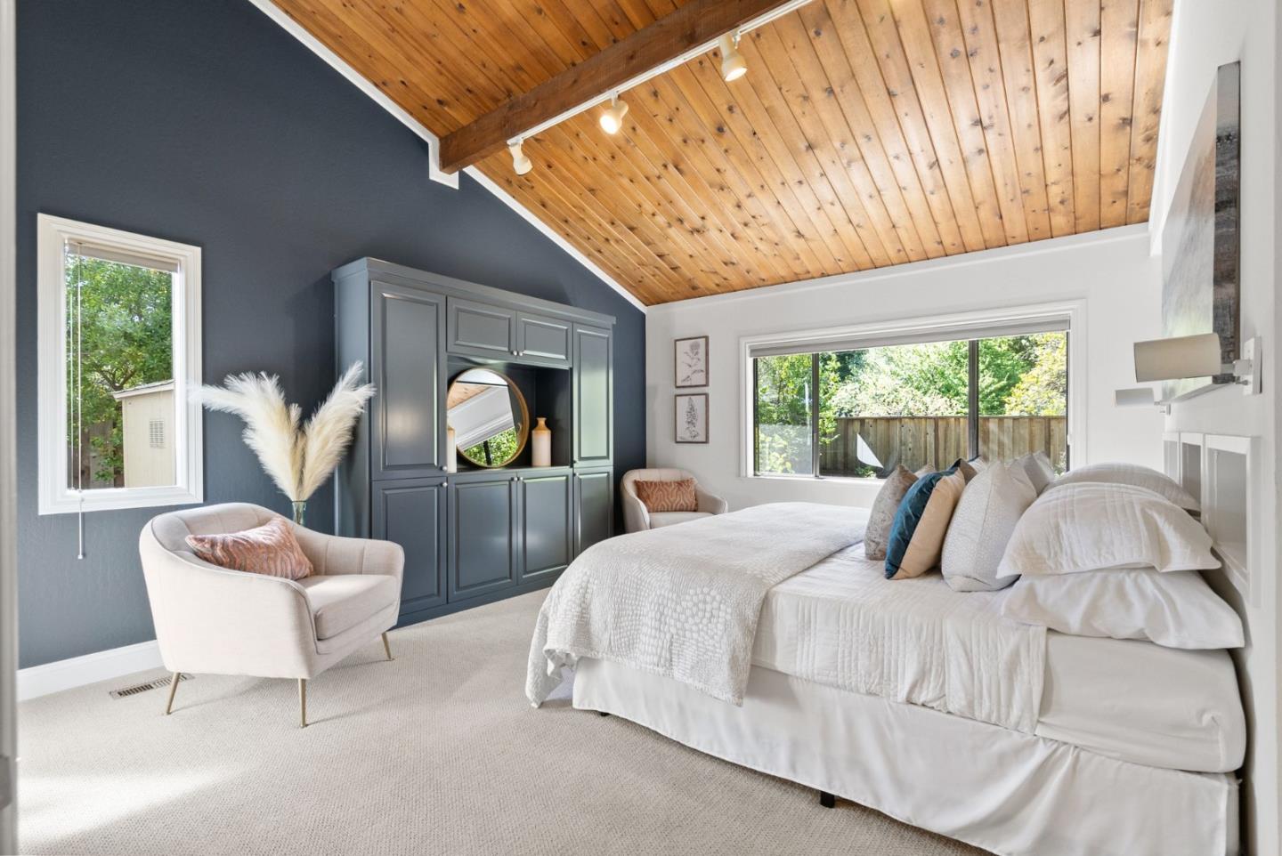 886 Berkeley Avenue Menlo Park, CA 94025 - Photo 14 of 46 a bedroom with a large bed and a window