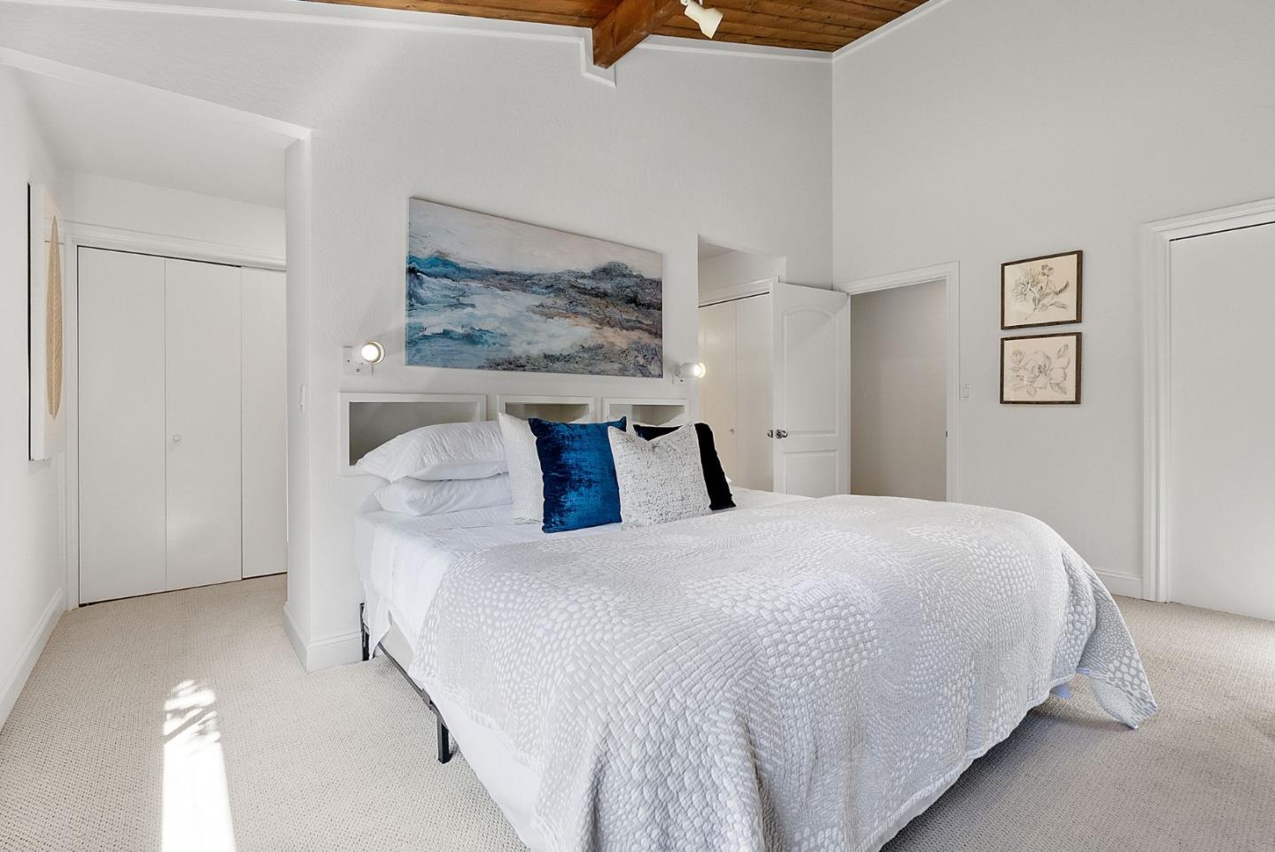 886 Berkeley Avenue Menlo Park, CA 94025 - Photo 18 of 46 a bedroom with a bed and lamp