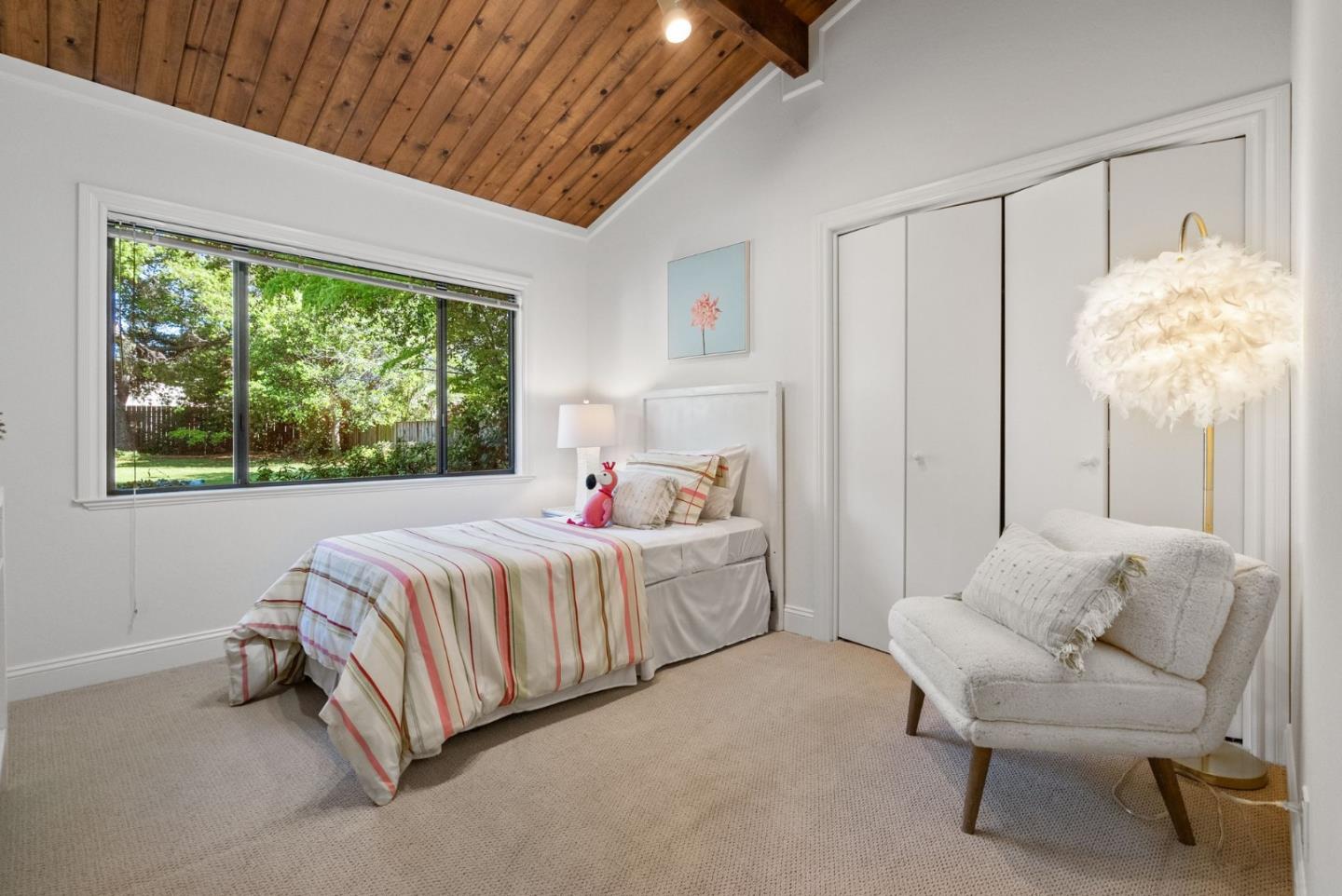 886 Berkeley Avenue Menlo Park, CA 94025 - Photo 20 of 46 a bed room with a bed and a chair