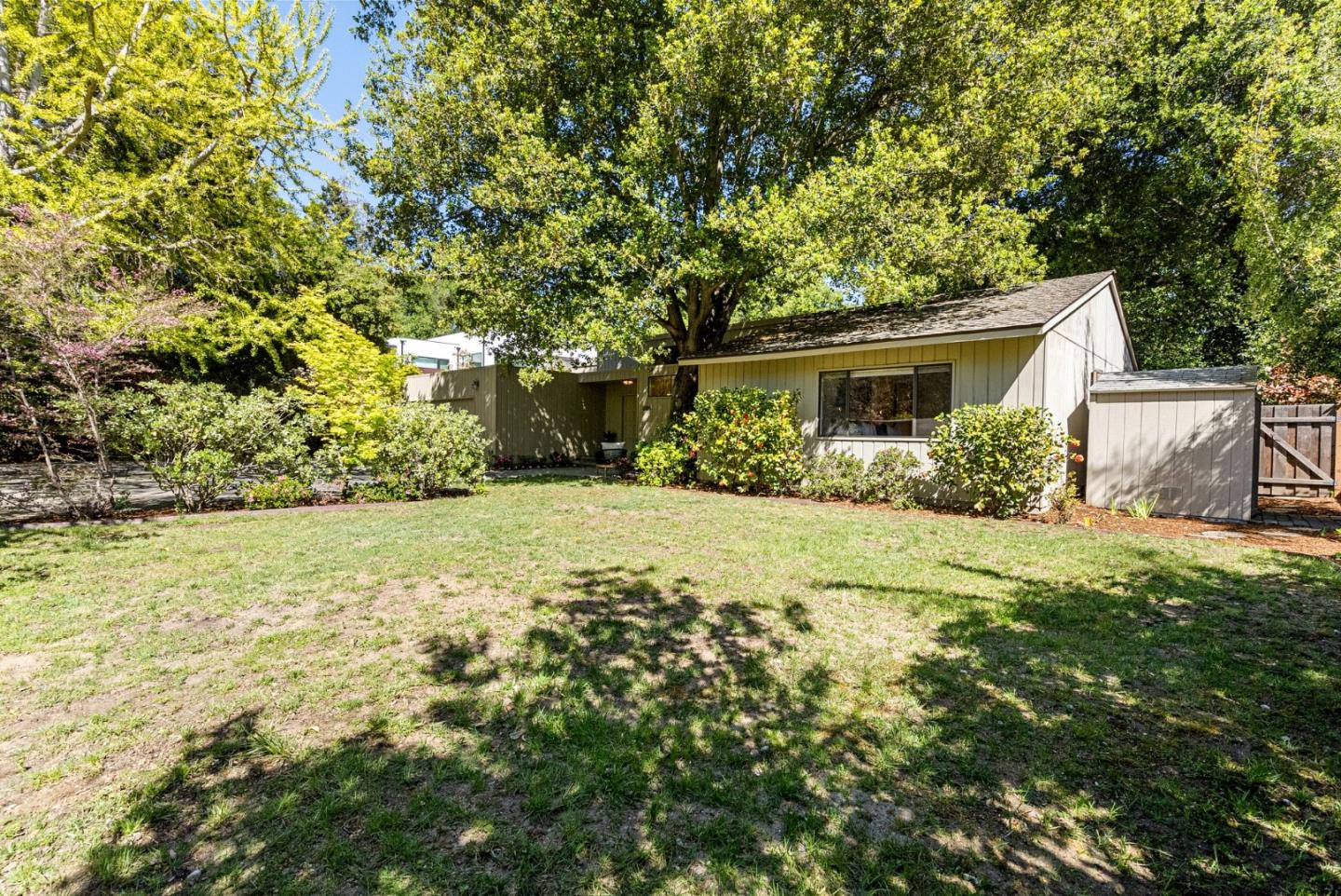 886 Berkeley Avenue Menlo Park, CA 94025 - Photo 22 of 46 a view of a house with yard and tree s