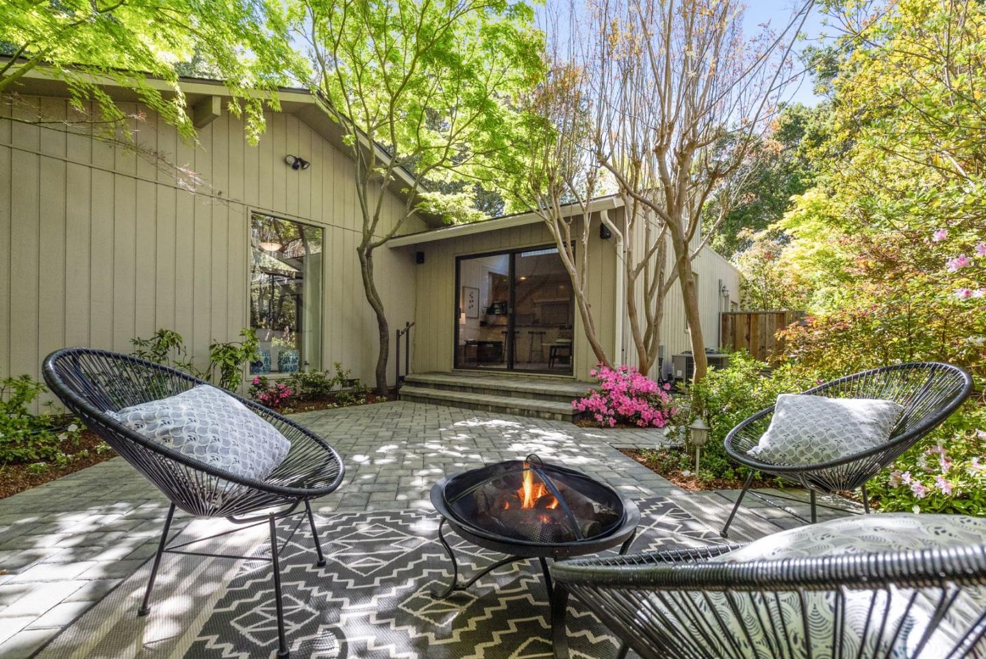886 Berkeley Avenue Menlo Park, CA 94025 - Photo 28 of 46 a view of a two chairs and table in backyard of the house