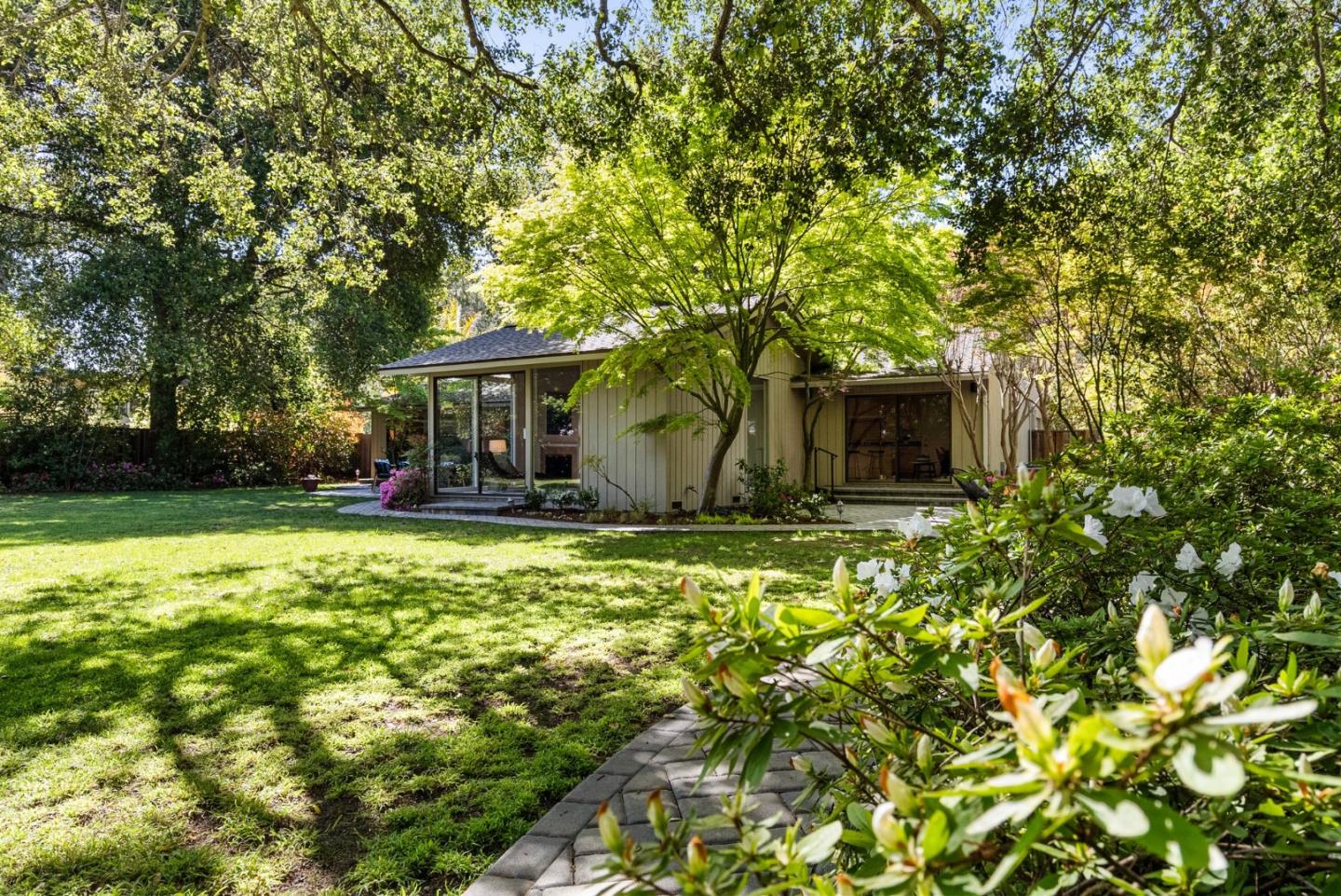 886 Berkeley Avenue Menlo Park, CA 94025 - Photo 30 of 46 a front view of a house with garden