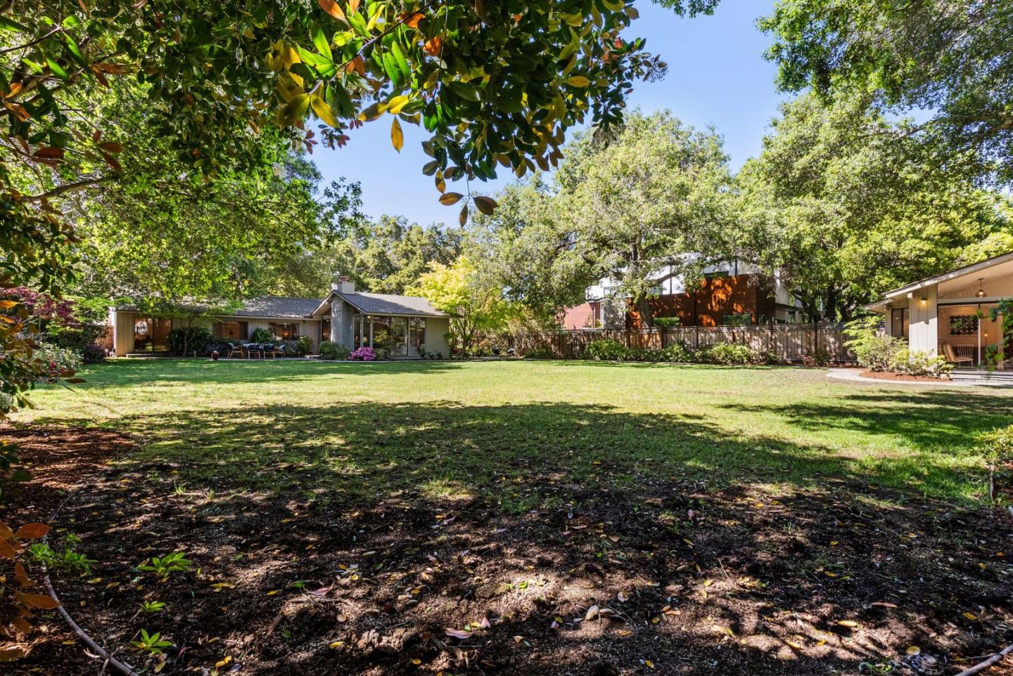 886 Berkeley Avenue Menlo Park, CA 94025 - Photo 31 of 46 a view of a house with a yard