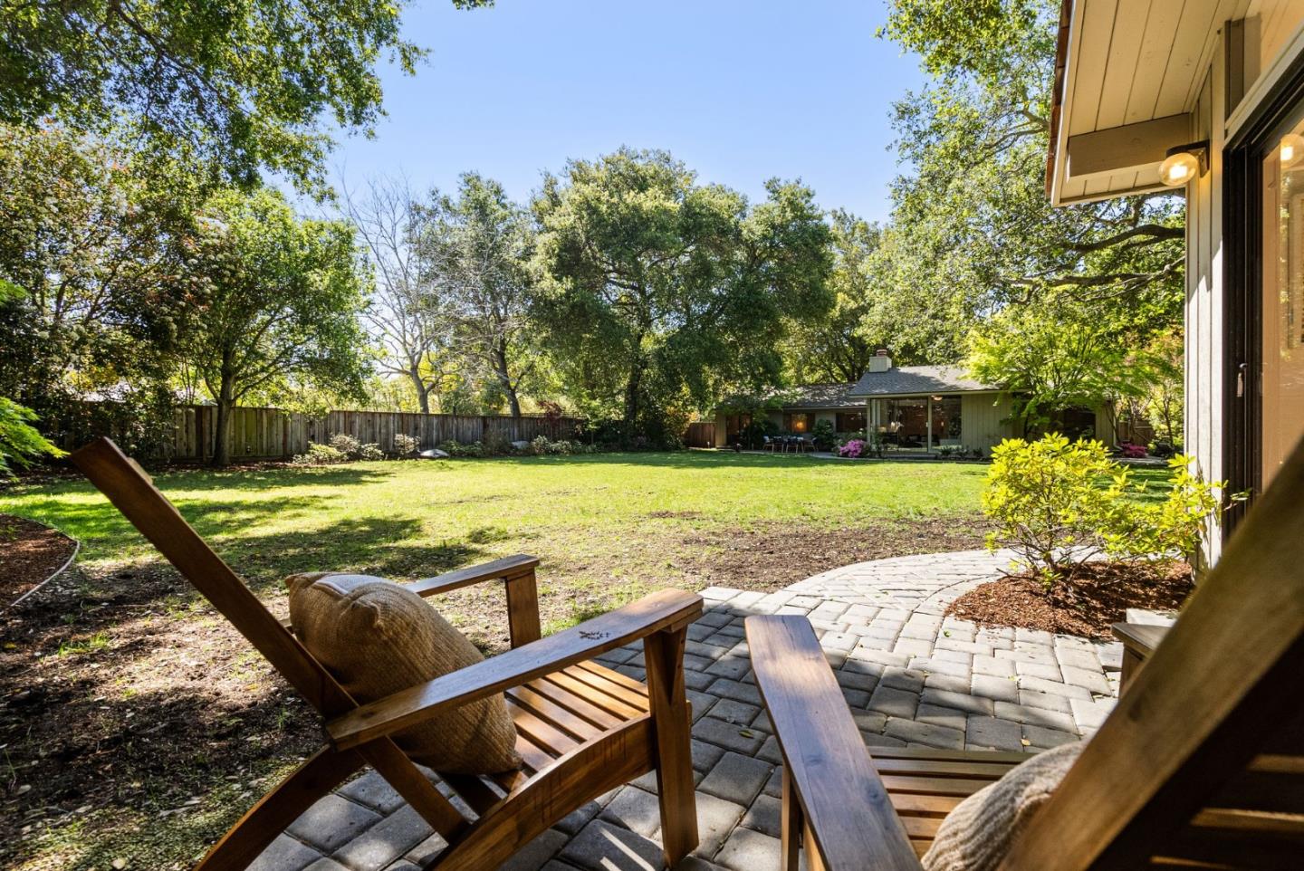 886 Berkeley Avenue Menlo Park, CA 94025 - Photo 32 of 46 a view of swimming pool with lawn chairs and plants
