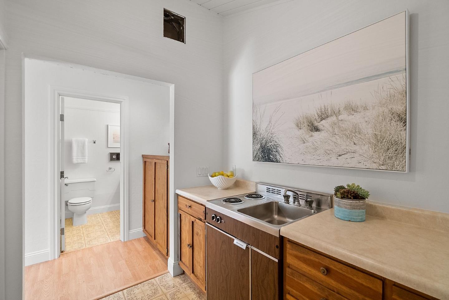886 Berkeley Avenue Menlo Park, CA 94025 - Photo 37 of 46 a view of a bathroom with a sink and a bath tub