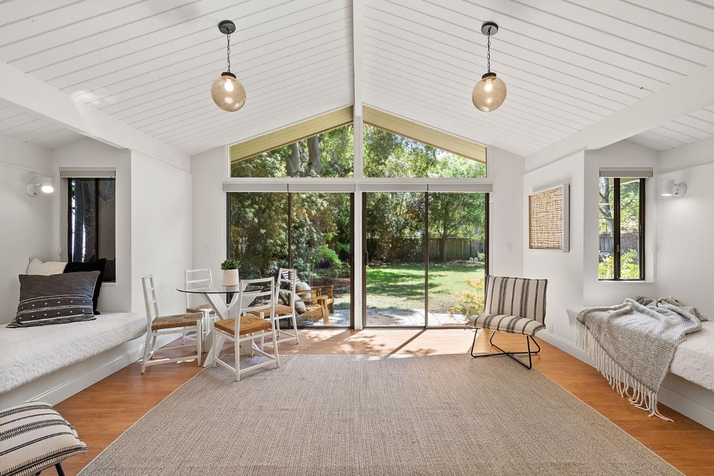 886 Berkeley Avenue Menlo Park, CA 94025 - Photo 39 of 46 a view of a livingroom with furniture and a large window