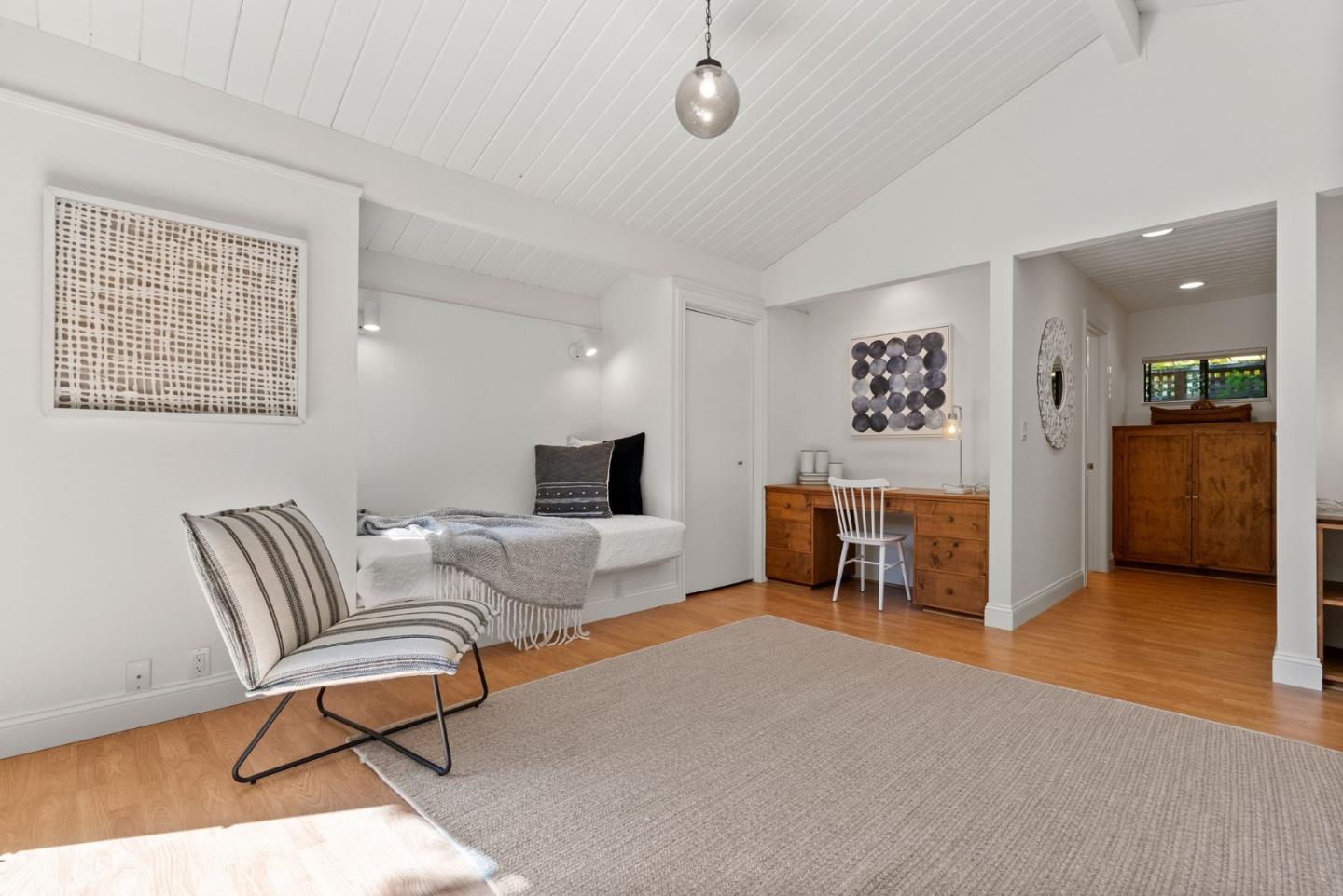 886 Berkeley Avenue Menlo Park, CA 94025 - Photo 40 of 46 a living room with furniture and a flat screen tv