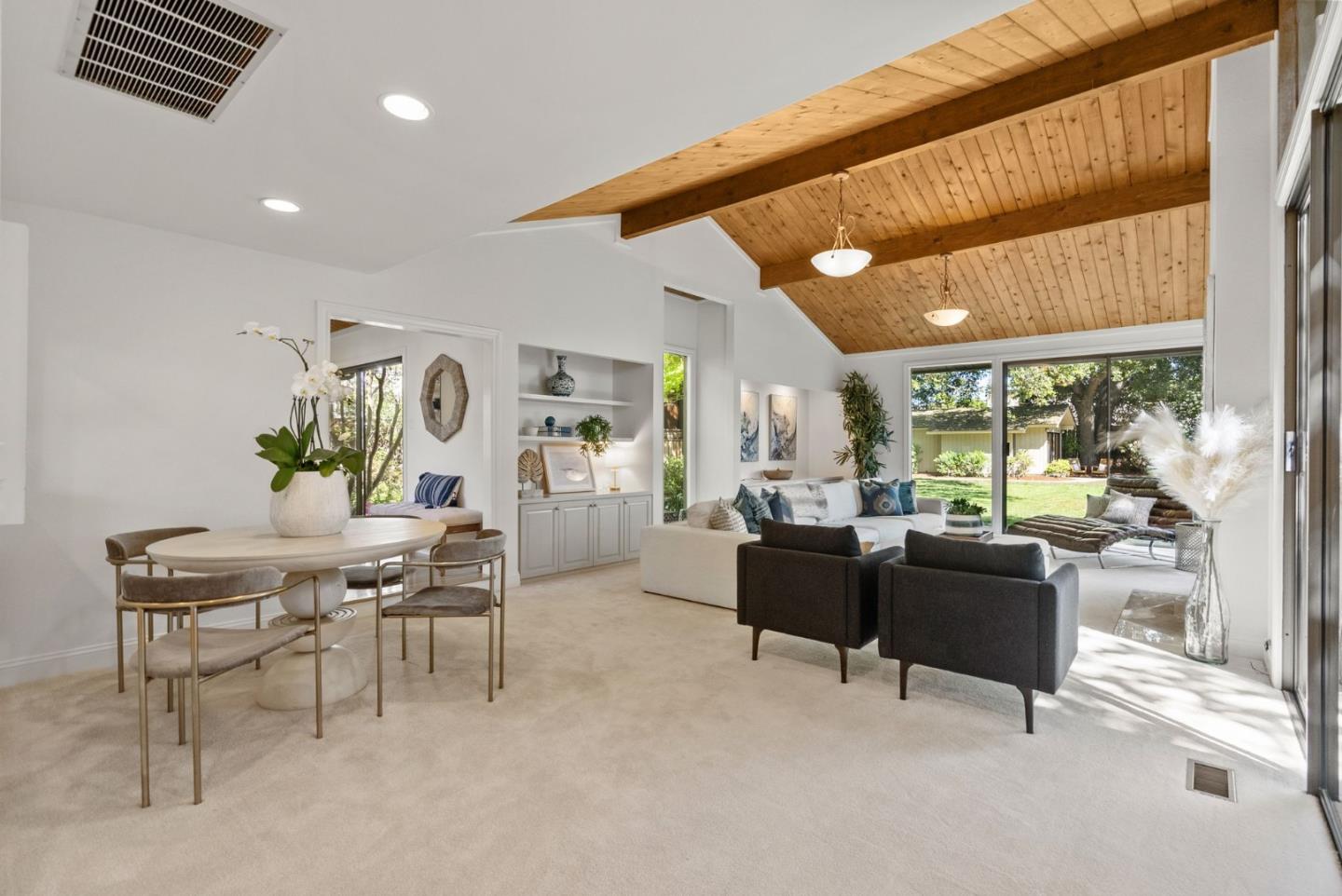 886 Berkeley Avenue Menlo Park, CA 94025 - Photo 4 of 46 a living room with furniture and a large window