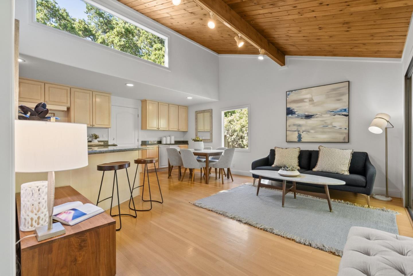 886 Berkeley Avenue Menlo Park, CA 94025 - Photo 8 of 46 a living room with furniture and a painting on the wall