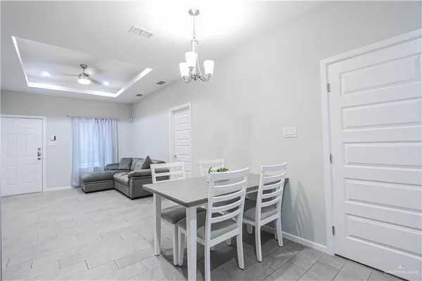 a kitchen with stainless steel appliances a refrigerator stove microwave and sink