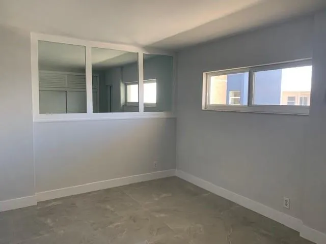 an empty room with a window