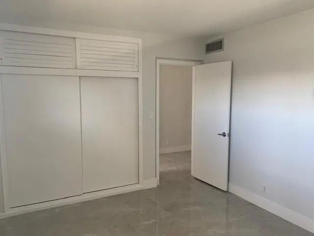 an empty room with closet