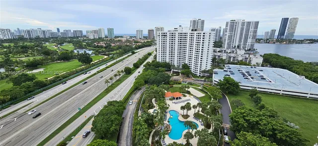 a view of swimming pool with a patio