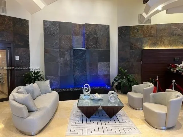 a view of entryway with livingroom and floor to bedroom