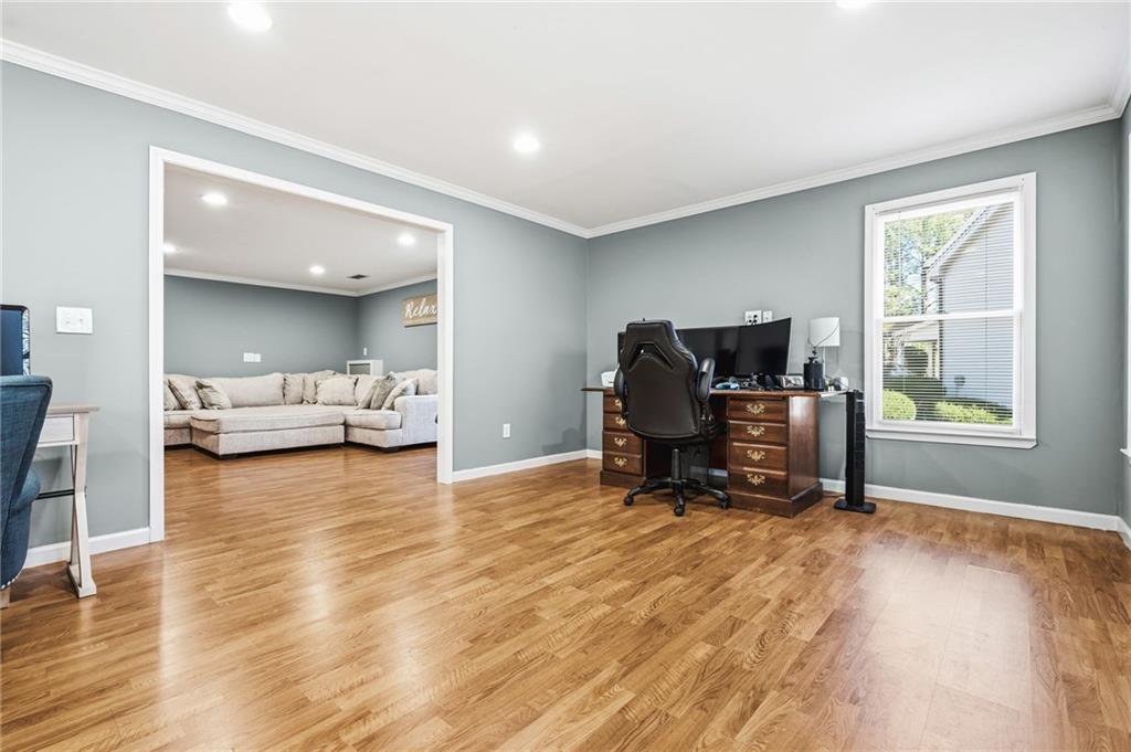 313 Spring Hill Drive Canton, GA 30115 - Photo 32 of 35 a view of a livingroom with workspace and a window