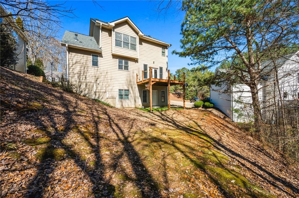 313 Spring Hill Drive Canton, GA 30115 - Photo 35 of 35 a front view of a house with a yard