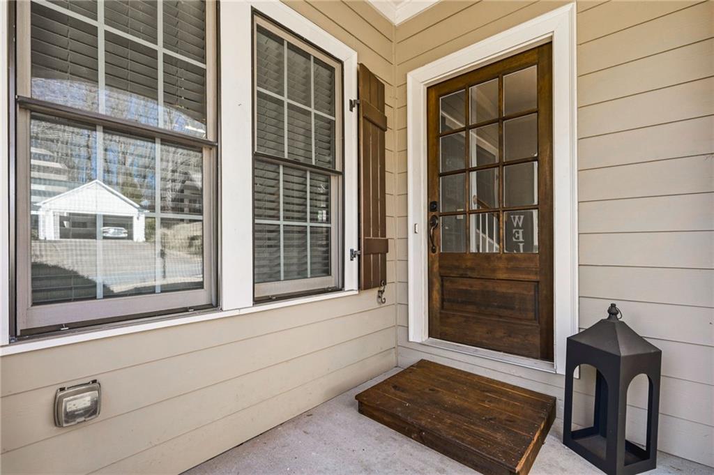313 Spring Hill Drive Canton, GA 30115 - Photo 5 of 35 a view of front door of house with a window