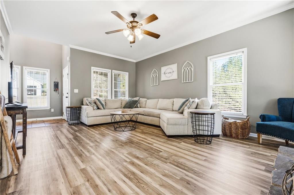 313 Spring Hill Drive Canton, GA 30115 - Photo 7 of 35 a living room with furniture and a large window