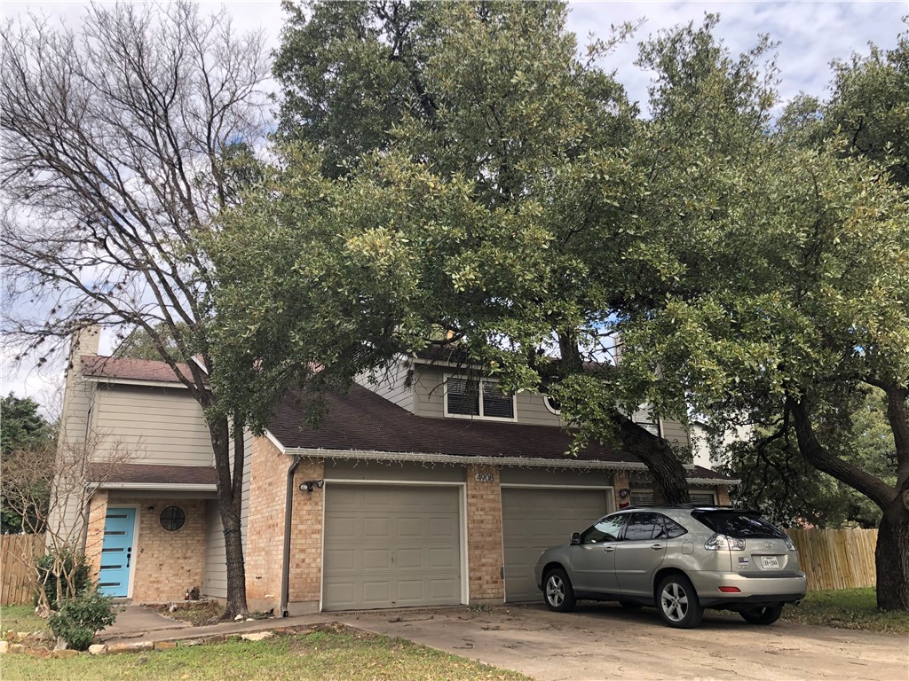 4908 Cana Cove, Unit A Austin, TX 78749 - Photo 1 of 1 a car parked in front of white house