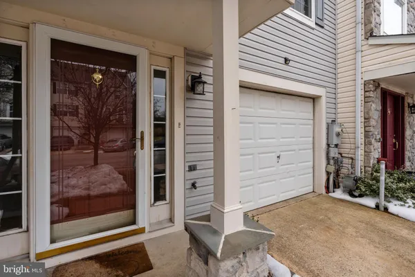 a view of a front door and a window