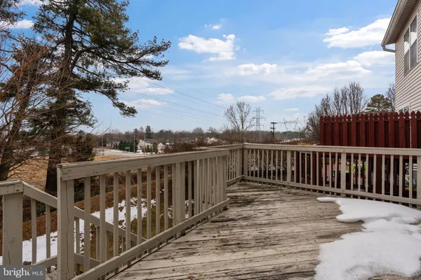 a view of a wooden roof deck