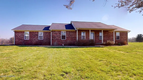 a view of a house with a garden