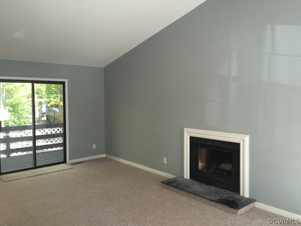 1500 Oldbury Road Midlothian, VA 23113 - Photo 5 of 22 an empty room with a fireplace