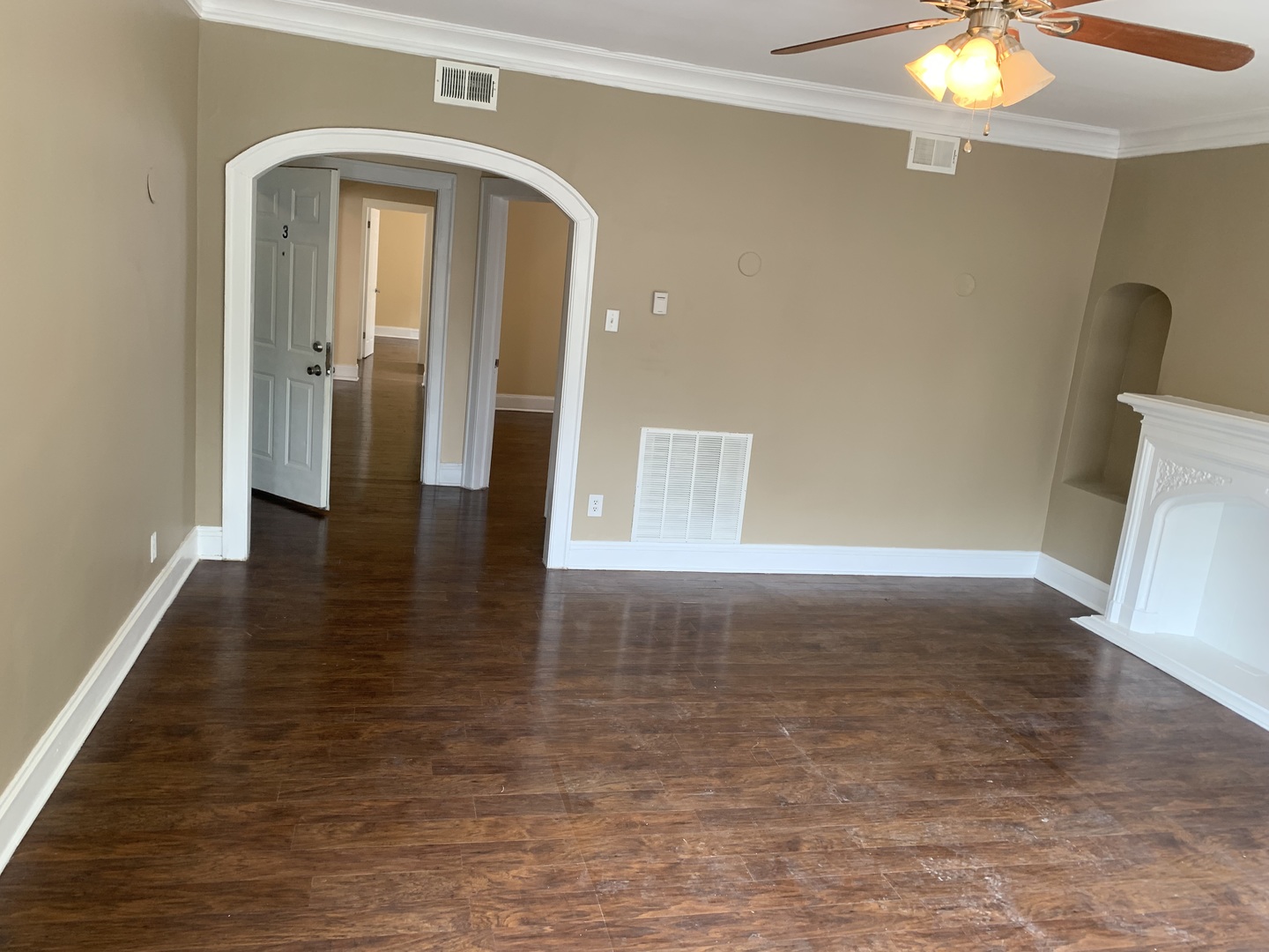 7831 South Cornell Avenue, Unit 3 Chicago, IL 60649 - Photo 2 of 11 a view of a hallway with wooden floor