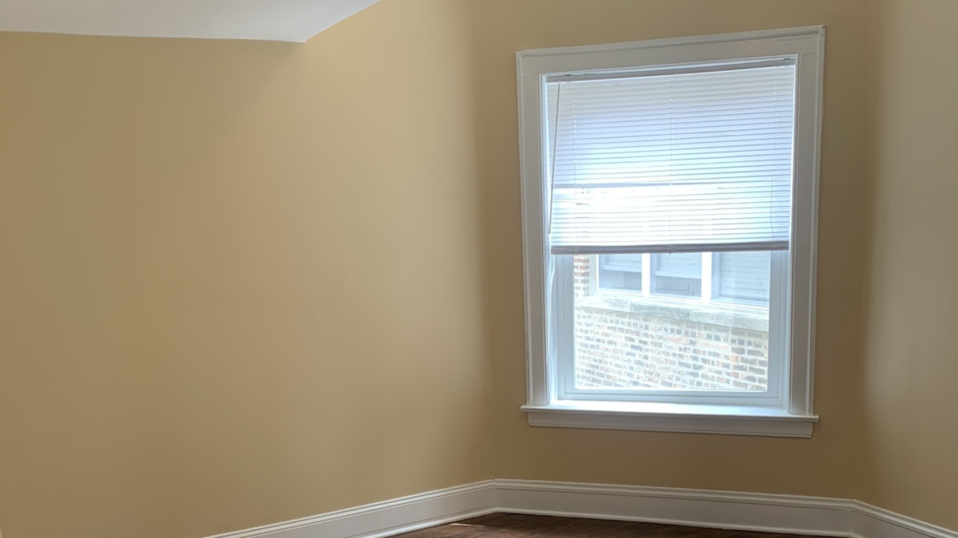 7831 South Cornell Avenue, Unit 3 Chicago, IL 60649 - Photo 3 of 11 a small space with a window
