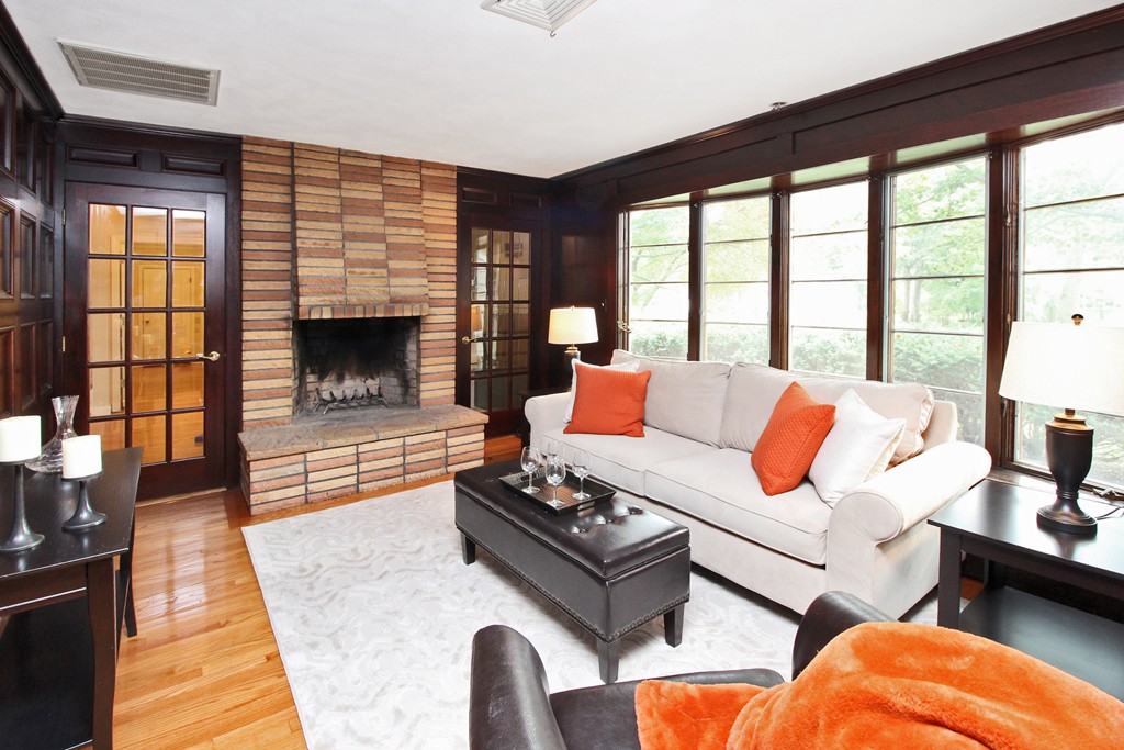 83 Spring Valley Road Belmont, MA 02478 - Photo 14 of 30 a living room with furniture fireplace and a table