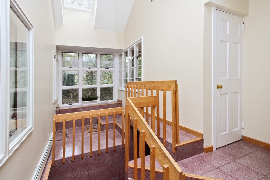83 Spring Valley Road Belmont, MA 02478 - Photo 15 of 30 a view of an entryway with staircase