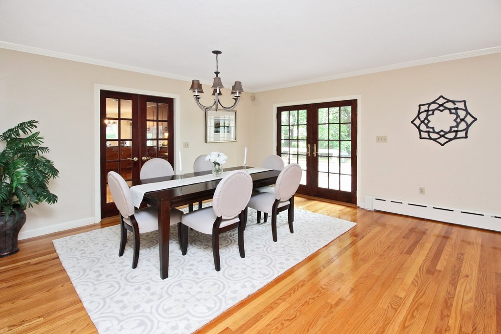 83 Spring Valley Road Belmont, MA 02478 - Photo 5 of 30 a view of a dining room with furniture window and wooden floor