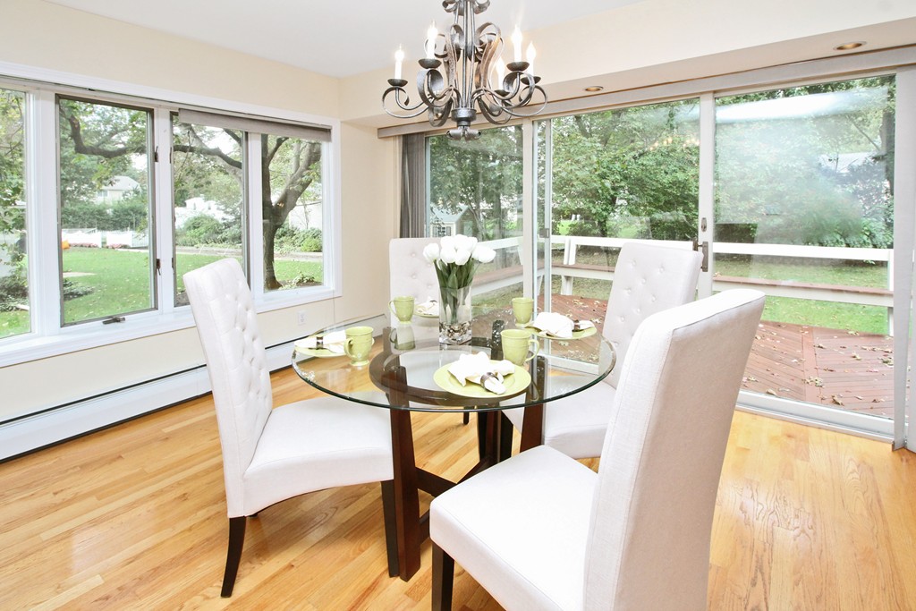 83 Spring Valley Road Belmont, MA 02478 - Photo 6 of 30 a view of a dining room with furniture window and outside view