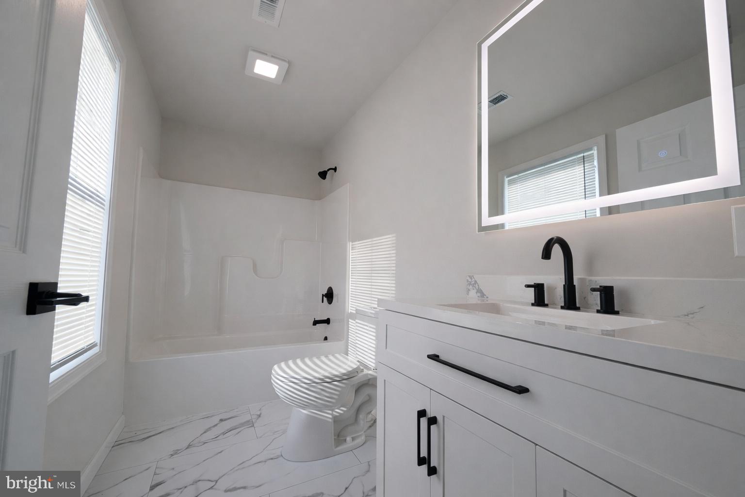 10824 Clipper Circle Princess Anne, MD 21853 - Photo 13 of 21 En suite bath w/ touchscreen antifog mirror