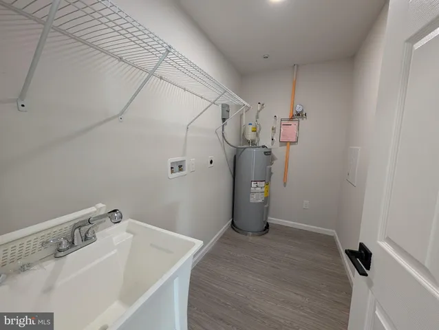 a bathroom with a sink and shower