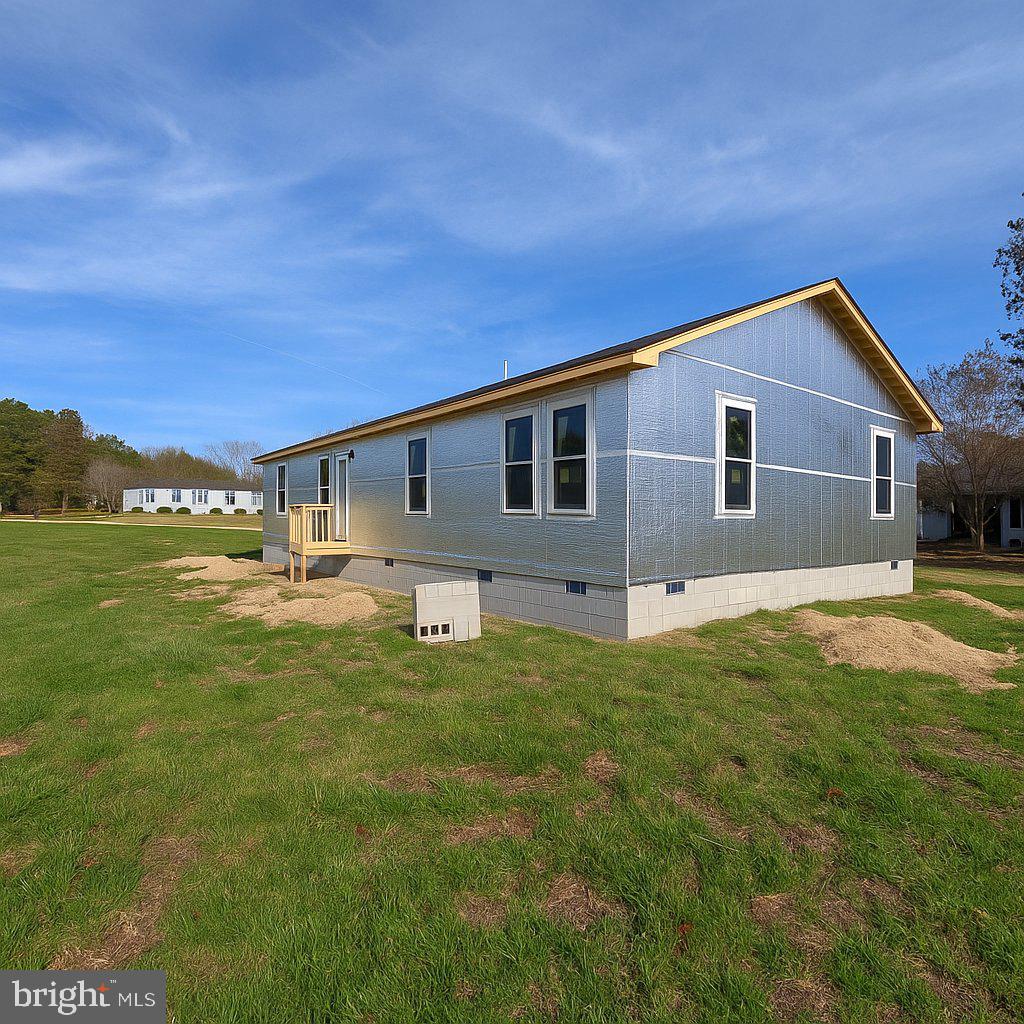 10824 Clipper Circle Princess Anne, MD 21853 - Photo 3 of 9 a house view with a garden space