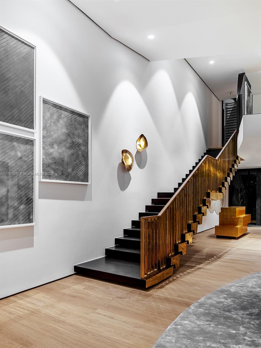 810 Lakeview Drive Miami Beach, FL 33140 - Photo 31 of 35 a view of entryway and hall with wooden floor