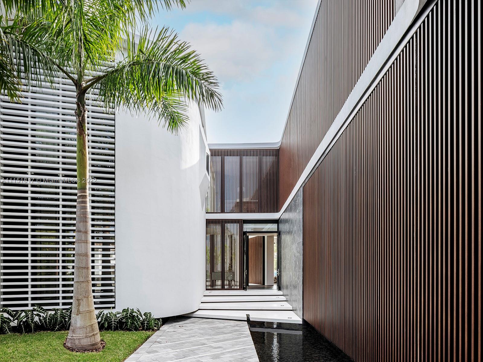 810 Lakeview Drive Miami Beach, FL 33140 - Photo 35 of 35 a view of entryway with a house