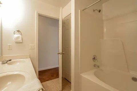 a bathroom with a sink and a tub