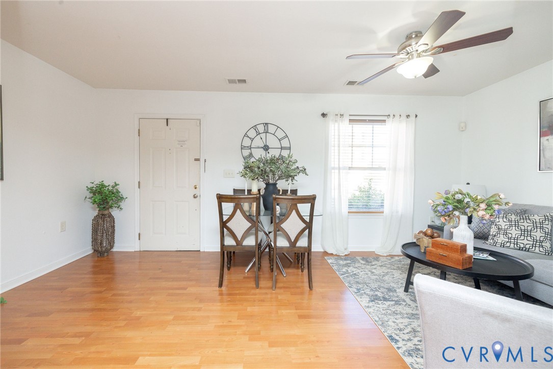 3520 East Richmond Road, Unit U106 Richmond, VA 23223 - Photo 5 of 18 Living room with light wood finished floors and ce