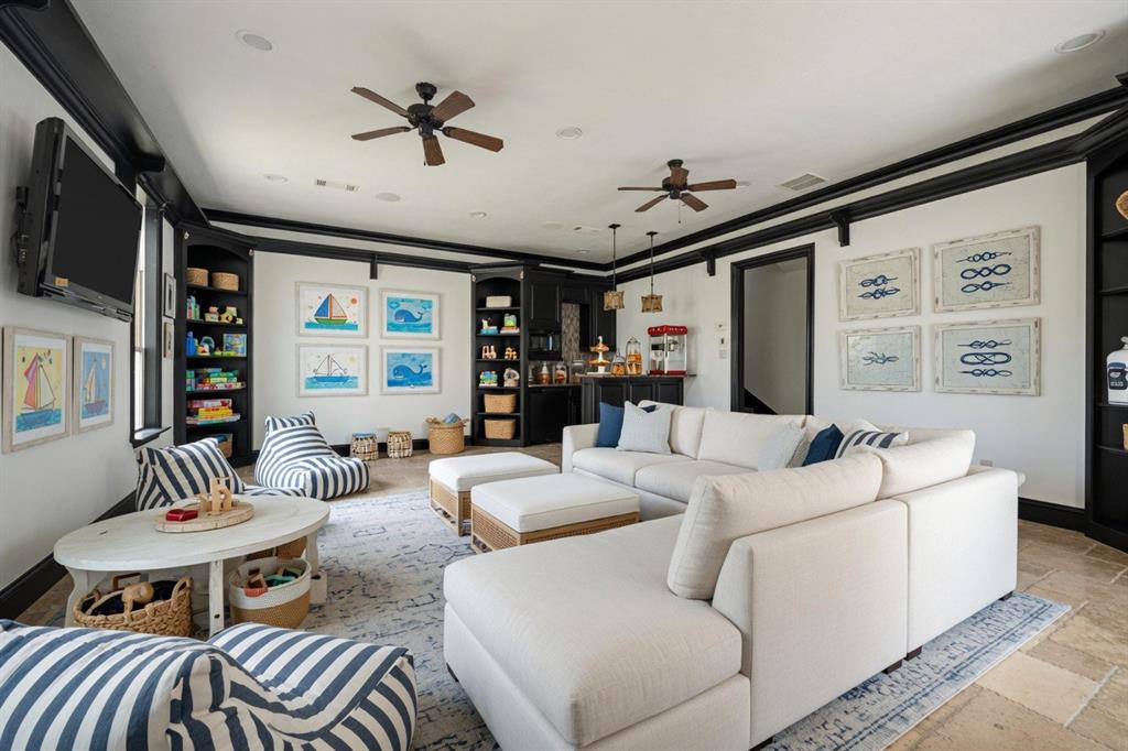 6900 Rockingham Court Colleyville, TX 76034 - Photo 25 of 40 1st Floor of Guest House ADU features a covered patio, kitchen with bar, ensuite bathroom, ceiling fans and utility closet. Can be used for extended stay guests, entertaining, nanny, or live-in quarters. Ai staged.