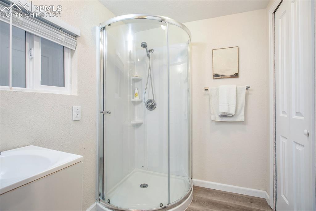 1495 North Yoder Road Yoder, CO 80864 - Photo 9 of 25 a bathroom with a shower a toilet and sink