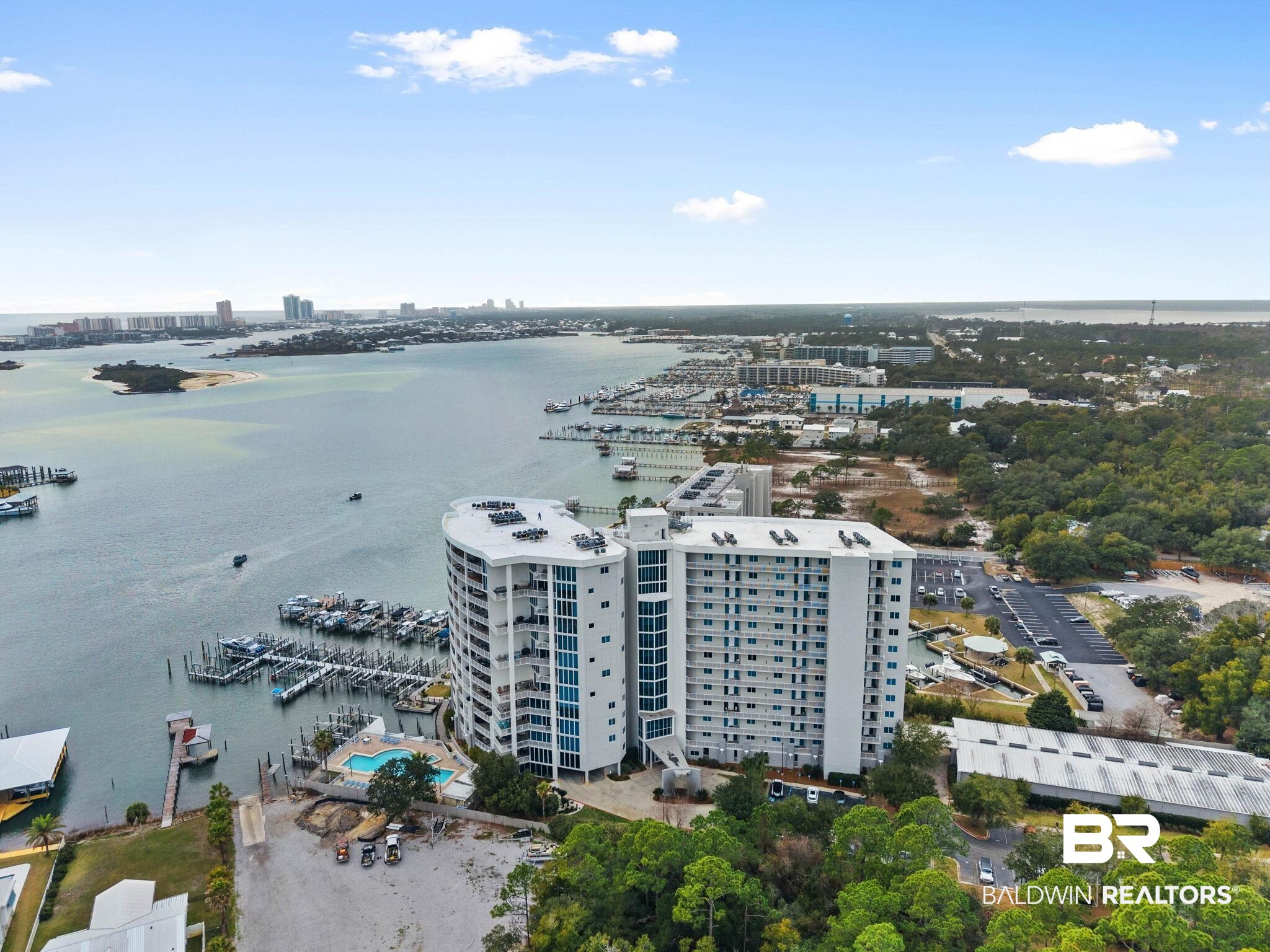 28250 Canal Road, Unit 208 Orange Beach, AL 36561 - Photo 47 of 53 View of urban area featuring a marina and a large body of water